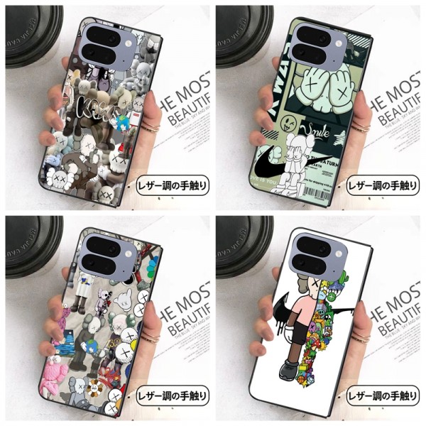 Kaws カウズかわいいGalaxy Z flip Fold 5 4 6 7 8ケース 耐衝撃レザー グーグル ピクセルPro 11 10 9 foldスマホケース 携帯カバー iPhone ultra fold 2026スマホケース気質オシャレ Galaxy z fold5 4 6 7 8ブランドスマホケース 