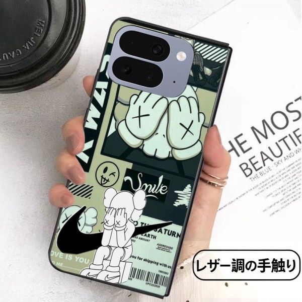 Kaws カウズかわいいGalaxy Z flip Fold 5 4 6 7 8ケース 耐衝撃レザー グーグル ピクセルPro 11 10 9 foldスマホケース 携帯カバー iPhone ultra fold 2026スマホケース気質オシャレ Galaxy z fold5 4 6 7 8ブランドスマホケース 