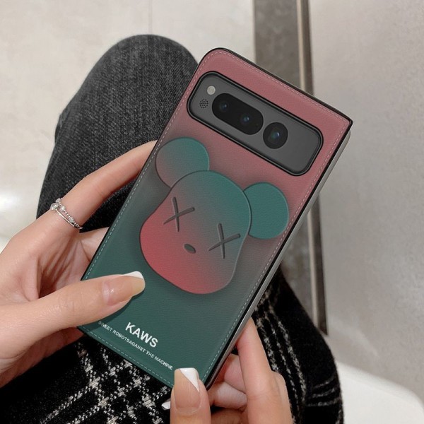 Kaws カウズおしゃれGoogle Pixel Fold/Fold2ケース 耐衝撃 傷防止ブランド グーグル ピクセル フォールド/フォールド2ケース軽量 ブランド スマホケース ハイブランド保護カバーレディース