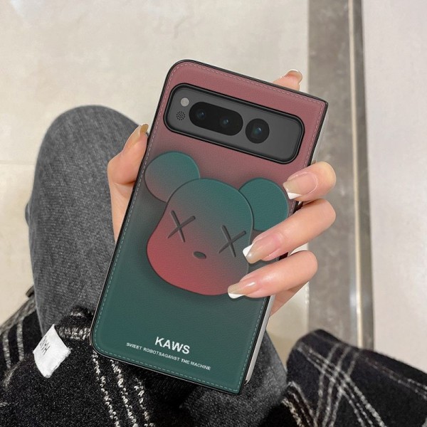 Kaws カウズおしゃれGoogle Pixel Fold/Fold2ケース 耐衝撃 傷防止ブランド グーグル ピクセル フォールド/フォールド2ケース軽量 ブランド スマホケース ハイブランド保護カバーレディース